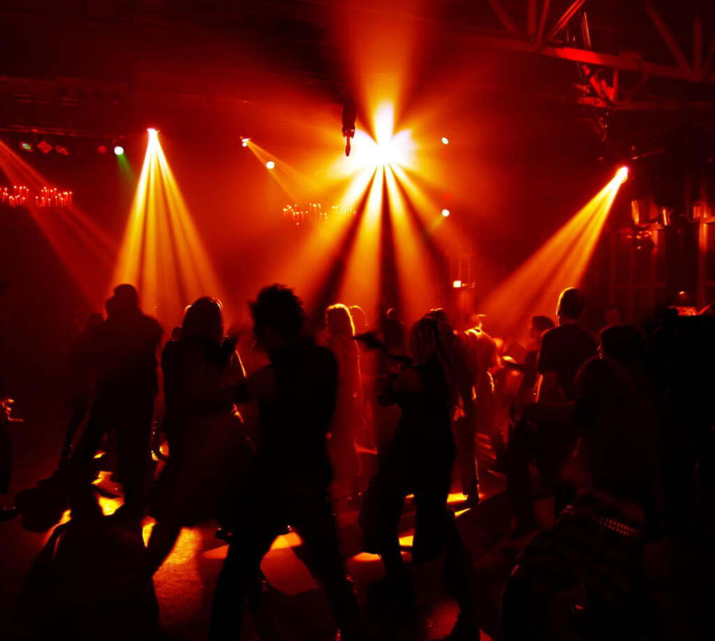 Professional Mobile DJ London and Surrey image of people dancing in dark room